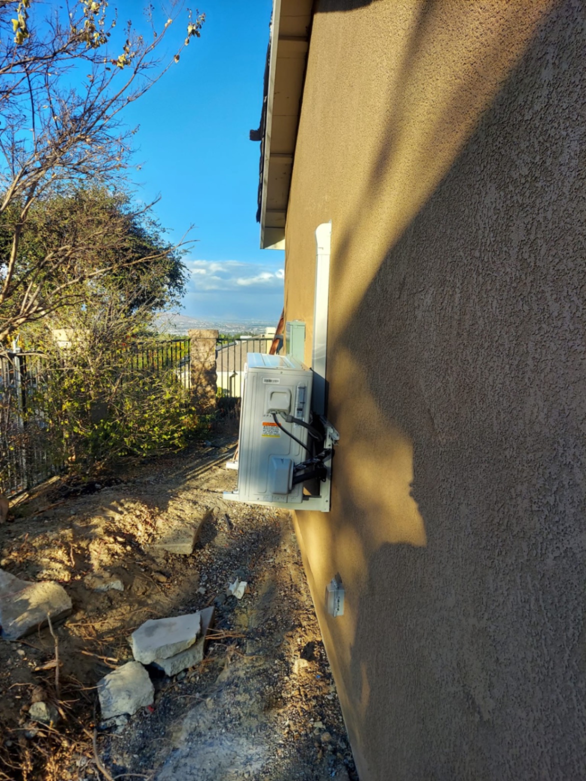 Wall-Mounted Mini-Split Condenser — Hillside Residential